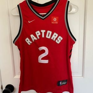 Boys Kawhi Leonard Raptors jersey. Size YXL.